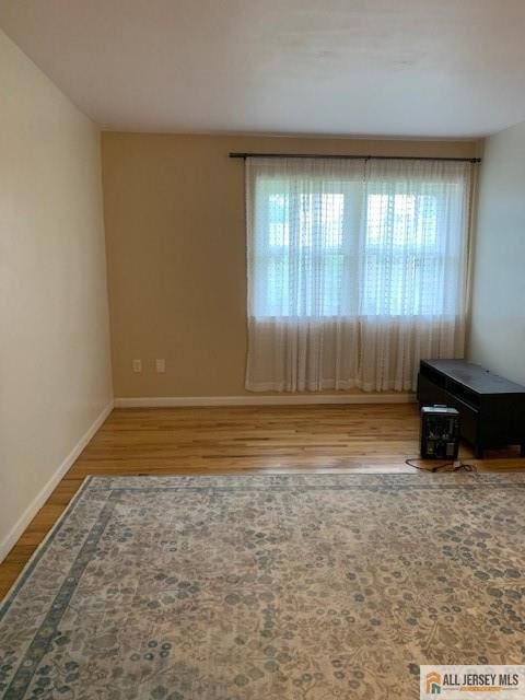47 Judson St Unit 14B, Edison, NJ 08837 - unfurnished room with wood finished floors and baseboards