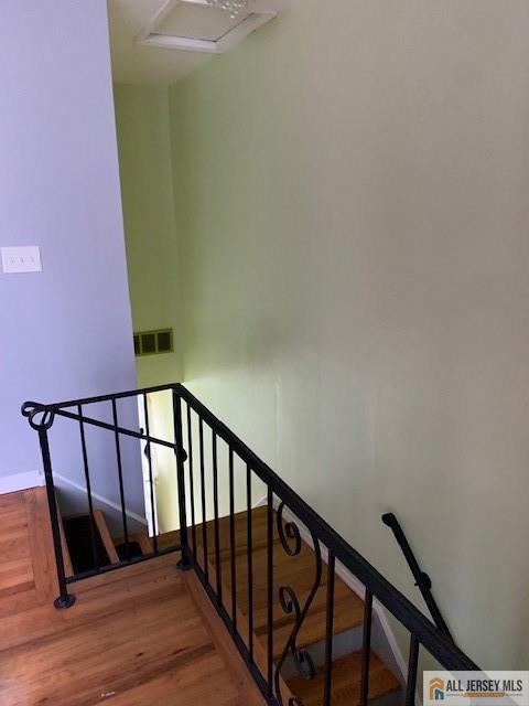 47 Judson St Unit 14B, Edison, NJ 08837 - stairs with baseboards and wood finished floors