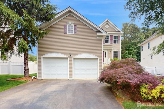 28 Walden Ct, Old Bridge, NJ 08857 - view of front of home with asphalt driveway and an attached garage