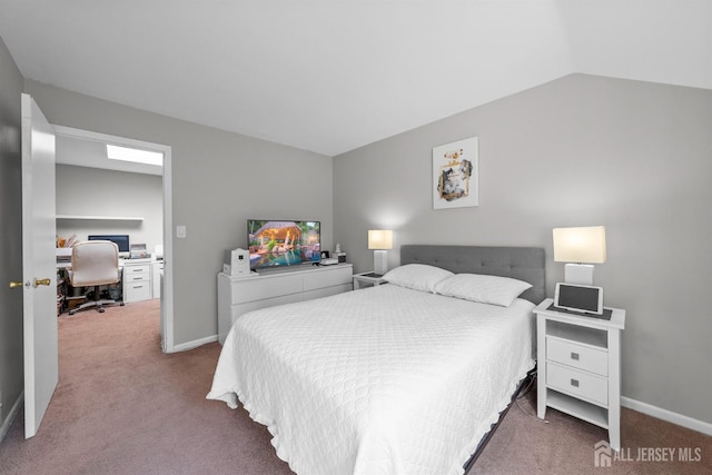 1058 Schmidt Ln, North Brunswick, NJ 08902 - carpeted bedroom featuring an office area, lofted ceiling, and baseboards