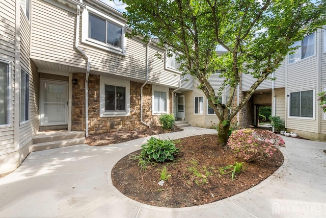 1058 Schmidt Ln, North Brunswick, NJ 08902 - exterior space with stone siding