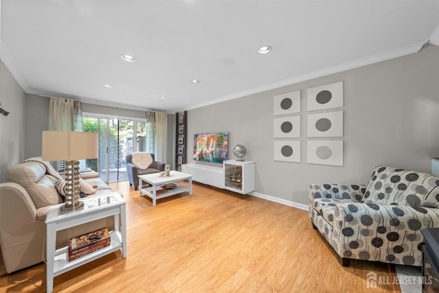 1058 Schmidt Ln, North Brunswick, NJ 08902 - living area with crown molding, wood finished floors, baseboards, and recessed lighting