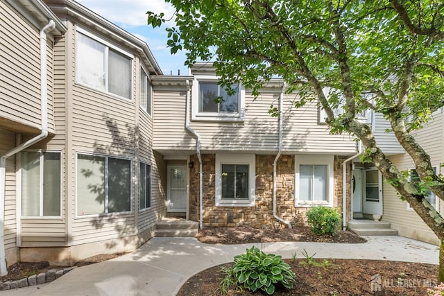 1058 Schmidt Ln, North Brunswick, NJ 08902 - view of front facade featuring stone siding