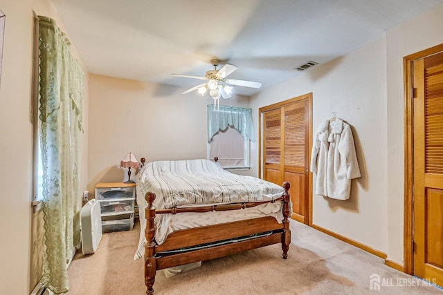 80 Gates Rd, Franklin Twsp, NJ 08873 - bedroom featuring light colored carpet, a closet, baseboards, visible vents, and a ceiling fan