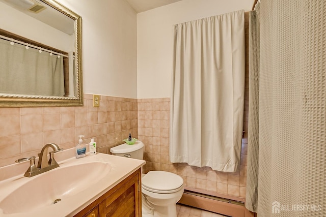80 Gates Rd, Franklin Twsp, NJ 08873 - full bath with a baseboard radiator, visible vents, toilet, tile walls, and vanity