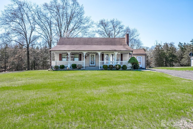 80 Gates Rd, Franklin Twsp, NJ 08873 - view of front of house featuring covered porch, a chimney, gravel driveway, and a front yard