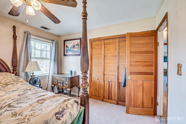 80 Gates Rd, Franklin Twsp, NJ 08873 - bedroom with visible vents, ceiling fan, a closet, and light carpet
