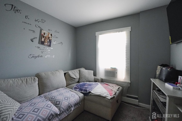 carpeted living room featuring cooling unit and baseboards