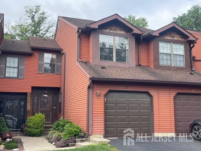 59 Bayberry Dr, Franklin, NJ 08873 - townhome / multi-family property with a garage and asphalt driveway