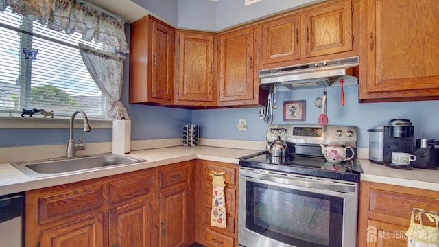 437 Belford Rd Unit B, Monroe, NJ 08831 - kitchen featuring under cabinet range hood, appliances with stainless steel finishes, a sink, and light countertops