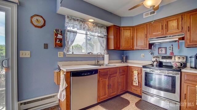 437 Belford Rd Unit B, Monroe, NJ 08831 - kitchen with stainless steel appliances, a baseboard radiator, under cabinet range hood, a ceiling fan, and light countertops