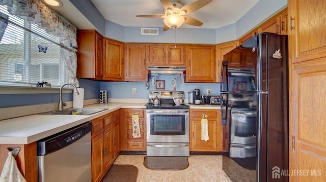437 Belford Rd Unit B, Monroe, NJ 08831 - kitchen featuring appliances with stainless steel finishes, a sink, under cabinet range hood, and brown cabinetry
