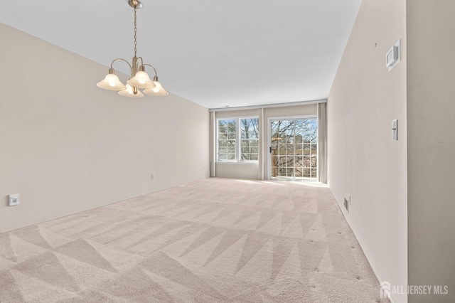 126 Concordia Cir Unit F, Monroe, NJ 08831 - carpeted empty room featuring visible vents and a notable chandelier