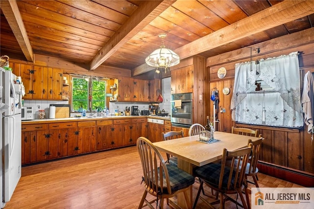 552 Parkview Ave, North Plainfield, NJ 07063 - dining space featuring wood ceiling with exposed beams, light wood-style floors, a chandelier, and wood walls
