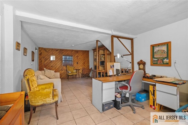 552 Parkview Ave, North Plainfield, NJ 07063 - office space with wood walls, light tile patterned floors, and a textured ceiling