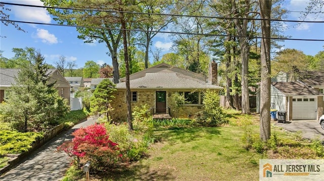 552 Parkview Ave, North Plainfield, NJ 07063 - view of front of home with a chimney, a garage, and driveway