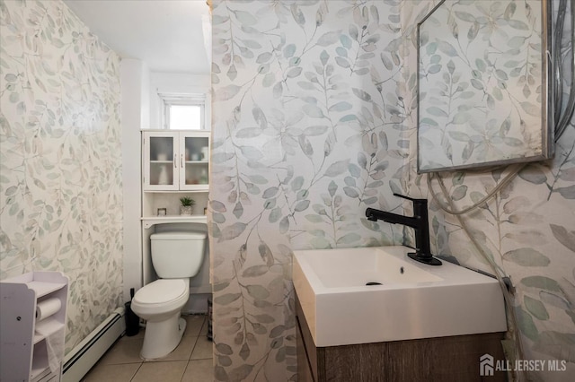 719 Catherine St, Perth Amboy, NJ 08861 - bathroom featuring toilet, tile patterned flooring, a baseboard heating unit, vanity, and wallpapered walls