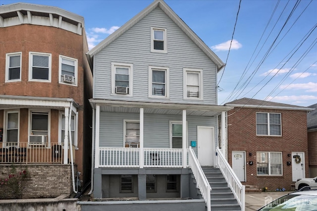 719 Catherine St, Perth Amboy, NJ 08861 - multi unit property featuring a porch and cooling unit
