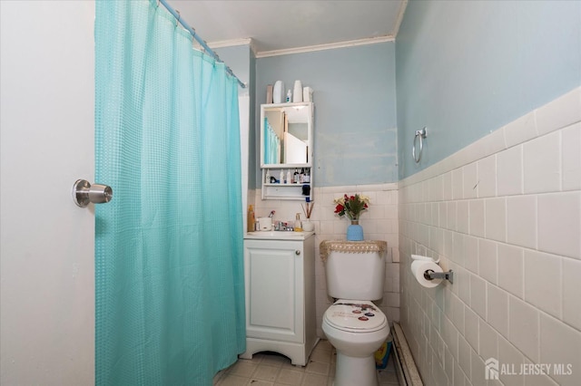 719 Catherine St, Perth Amboy, NJ 08861 - bathroom featuring toilet, crown molding, tile patterned flooring, vanity, and tile walls
