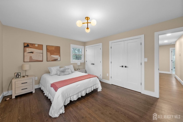 344 W Point Ave W, Franklin Twsp, NJ 08873 - bedroom with multiple closets, baseboards, and wood finished floors