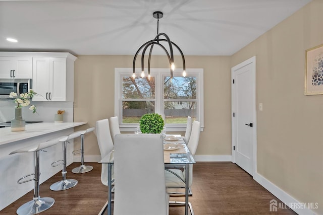 344 W Point Ave W, Franklin Twsp, NJ 08873 - dining space featuring baseboards and dark wood-style flooring