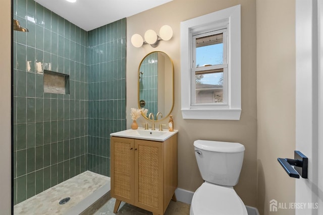 344 W Point Ave W, Franklin Twsp, NJ 08873 - bathroom with vanity, baseboards, a tile shower, and toilet