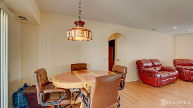 dining room with hardwood / wood-style floors