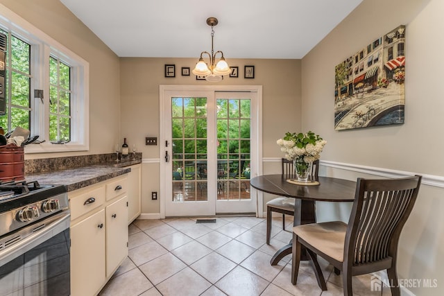 14 Bonnie Brook Ter, Middlesex, NJ 08846 - dining room featuring light tile patterned flooring and a chandelier