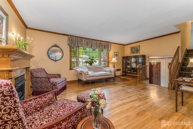 14 Bonnie Brook Ter, Middlesex, NJ 08846 - living room featuring wood finished floors, crown molding, stairs, a fireplace, and baseboards