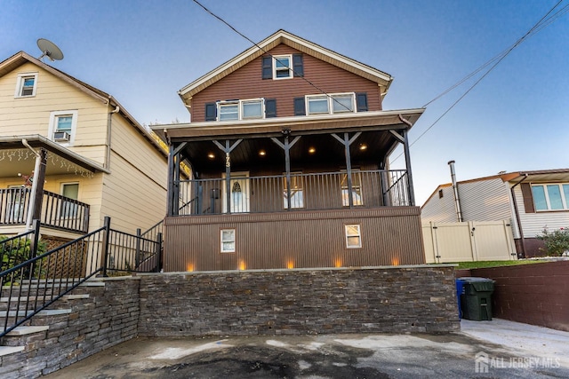 view of property with a balcony