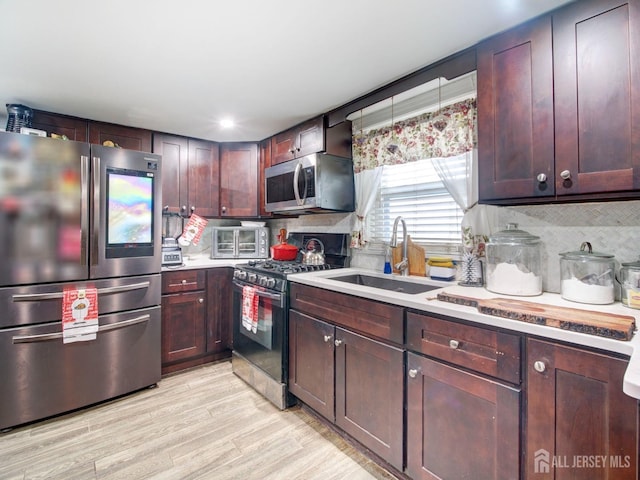 381 Keene St, Perth Amboy, NJ 08861 - kitchen with stainless steel appliances, light countertops, decorative backsplash, and recessed lighting
