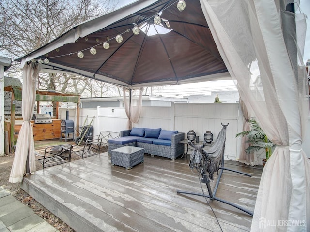 381 Keene St, Perth Amboy, NJ 08861 - wooden deck featuring a gazebo and an outdoor living space