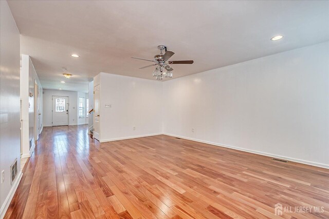 230 S 10th Ave S, Highland Park, NJ 08904 - spare room with a ceiling fan, light wood-type flooring, recessed lighting, and stairs