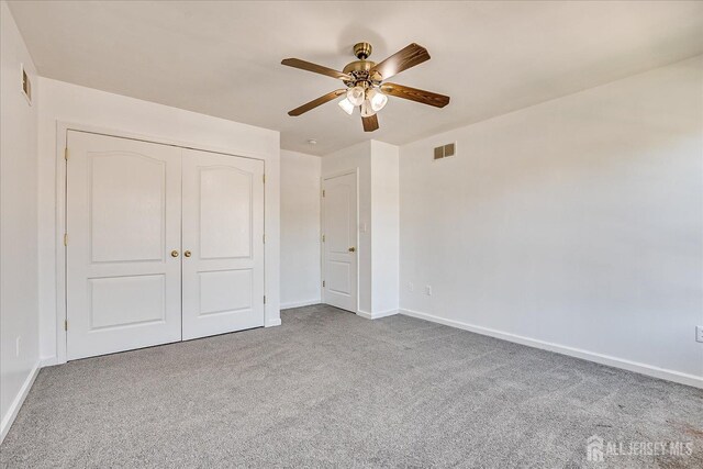 230 S 10th Ave S, Highland Park, NJ 08904 - unfurnished bedroom featuring carpet, a closet, and ceiling fan