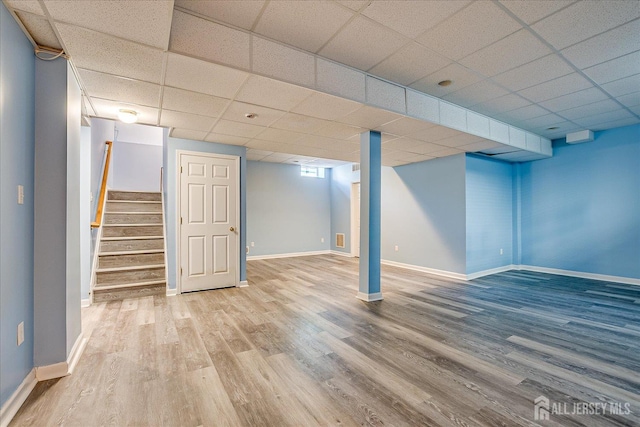 230 S 10th Ave S, Highland Park, NJ 08904 - finished basement featuring a drop ceiling, wood finished floors, and stairway