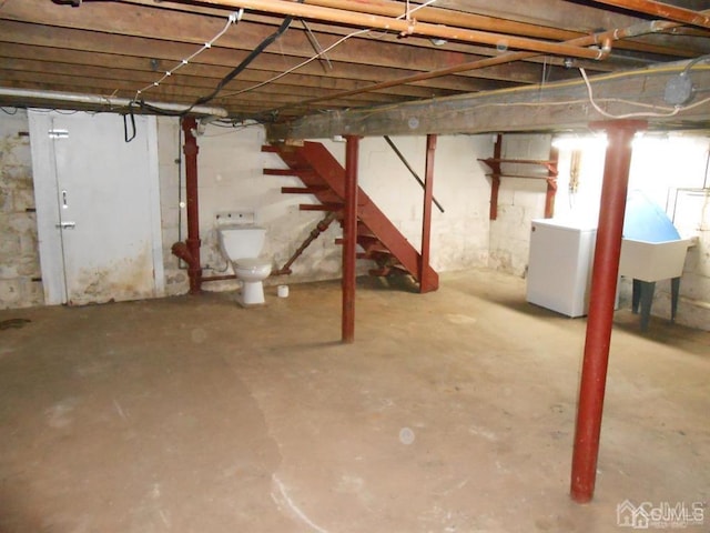 basement with washer / clothes dryer