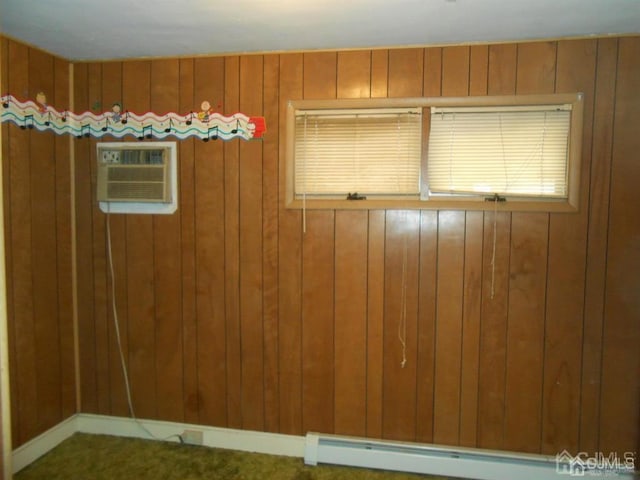 spare room featuring a baseboard heating unit