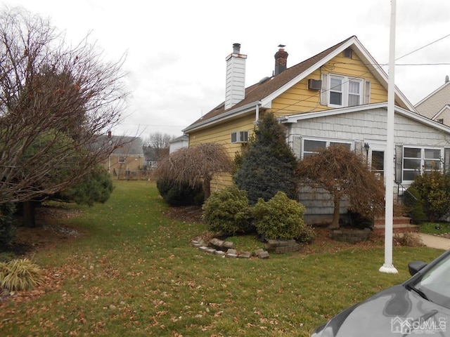 view of property exterior featuring a yard