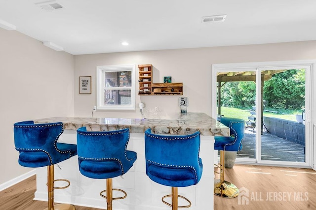 24 Bentley Rd, Monroe, NJ 08831 - indoor wet bar featuring wood finished floors, recessed lighting, and baseboards