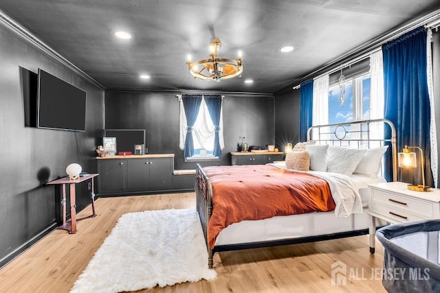 24 Bentley Rd, Monroe, NJ 08831 - bedroom with a chandelier, crown molding, recessed lighting, and light wood-style floors