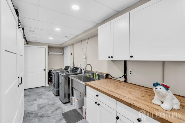 24 Bentley Rd, Monroe, NJ 08831 - washroom featuring washing machine and dryer, cabinet space, and recessed lighting