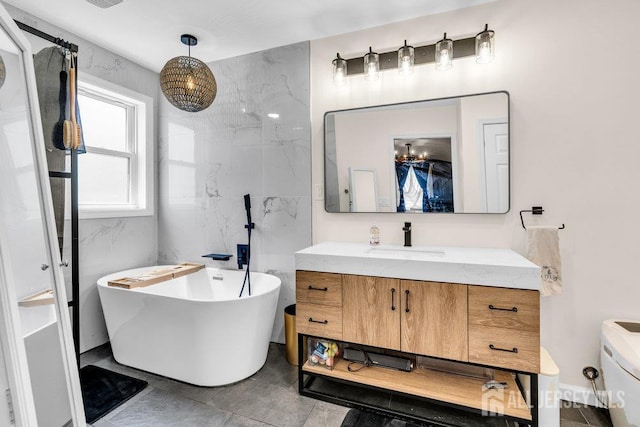 24 Bentley Rd, Monroe, NJ 08831 - bathroom featuring a freestanding bath, vanity, and toilet