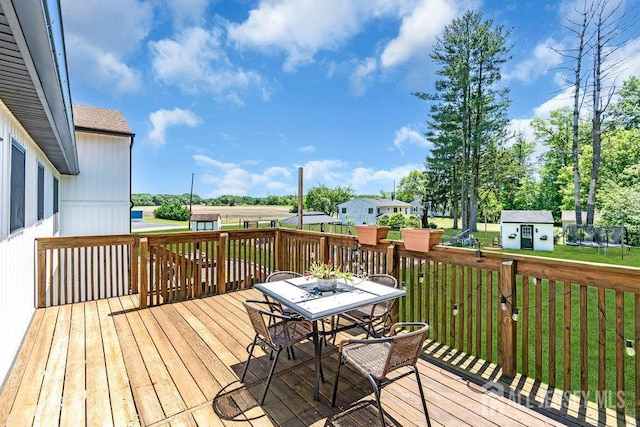 24 Bentley Rd, Monroe, NJ 08831 - deck featuring outdoor dining area and a yard