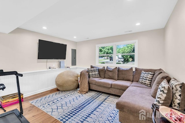 24 Bentley Rd, Monroe, NJ 08831 - living area with electric panel, wood finished floors, a wainscoted wall, and recessed lighting