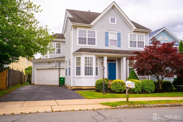 12 Elsie Dr, Plainsboro, NJ 08536 - traditional-style home with driveway and a garage