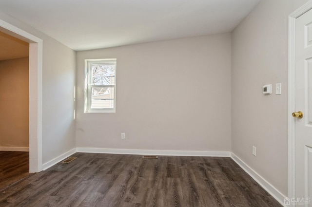 23 Hazelhurst St, New Brunswick, NJ 08901 - unfurnished bedroom featuring dark wood-style flooring