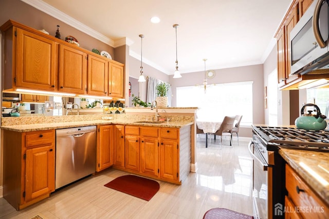 19 Crescent Rd, Old Bridge, NJ 08857 - kitchen featuring appliances with stainless steel finishes, a sink, light stone counters, pendant lighting, and crown molding