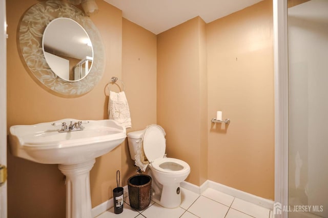 19 Crescent Rd, Old Bridge, NJ 08857 - bathroom featuring toilet, tile patterned floors, and baseboards