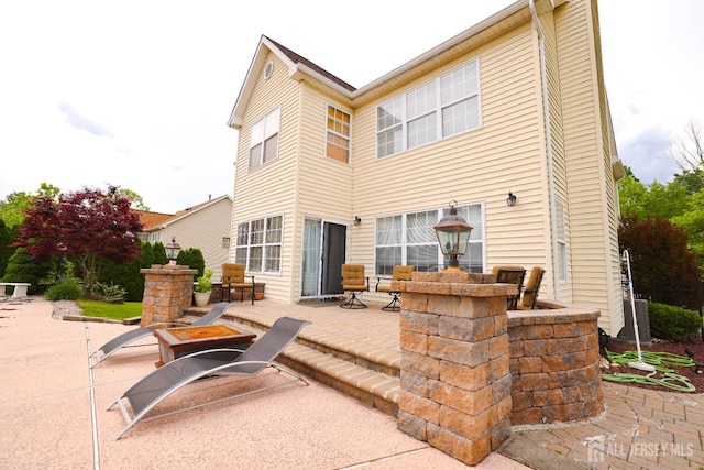 19 Crescent Rd, Old Bridge, NJ 08857 - rear view of house featuring a patio and central air condition unit