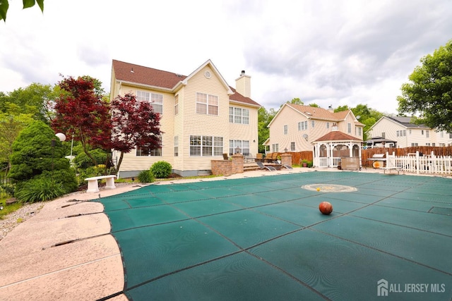 19 Crescent Rd, Old Bridge, NJ 08857 - view of swimming pool with a gazebo, a covered pool, a residential view, and a patio area